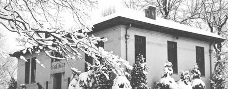 Black and white picture of Carnegie Public Library covered in snow